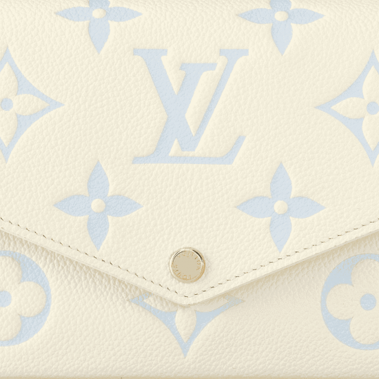 Félicie Pochette LatteCandy Blue Monogram Empreinte Leather M83025